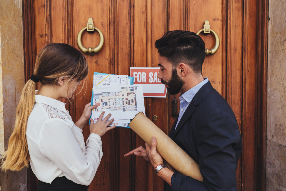 real-estate-agents-working-building-s-main-entrance-scaled